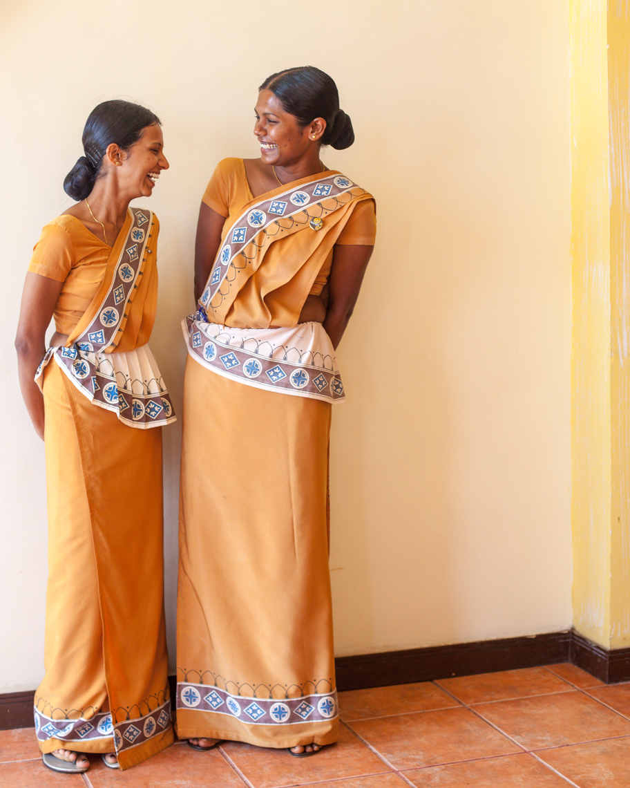 Women hotel staff members laughing