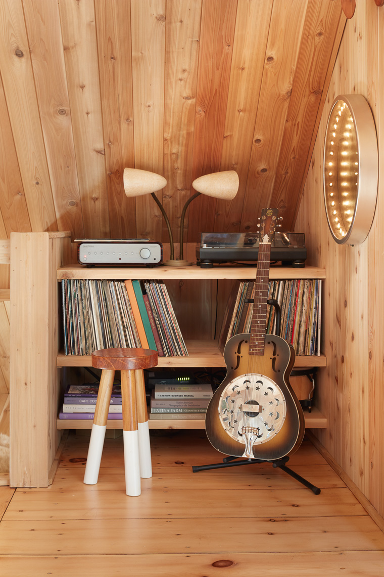 Detail view of guitar and record player