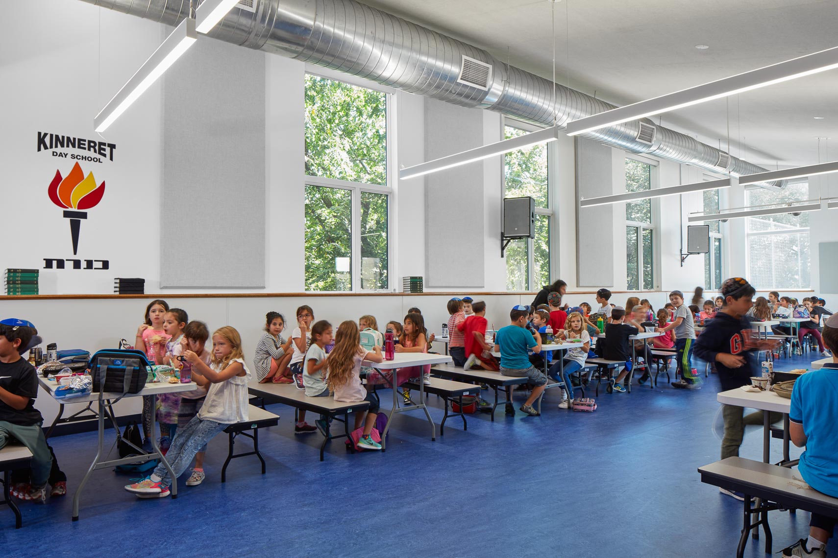 School children in a large lunch room