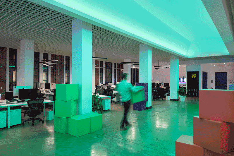 Animation of multicolor lights in high tech office interior